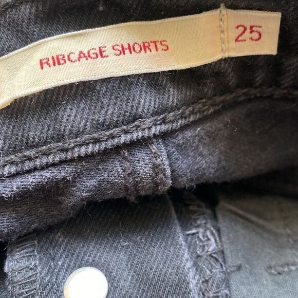 Levi’s Ribcage High Waisted Cutoff Shorts in Black Bayou Washed Black - Picture 2 of 5